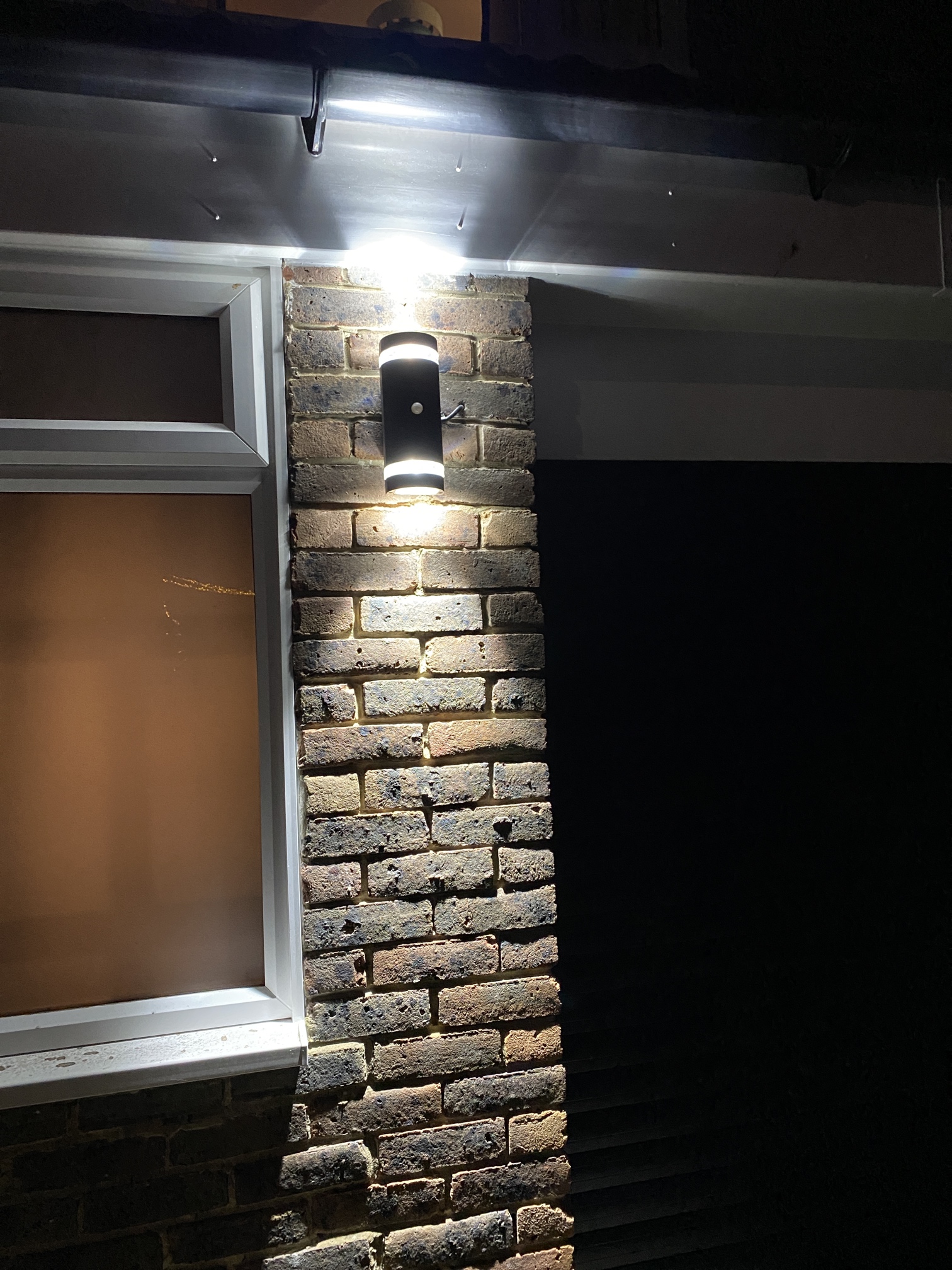 Welcoming Up- down light at Front Door